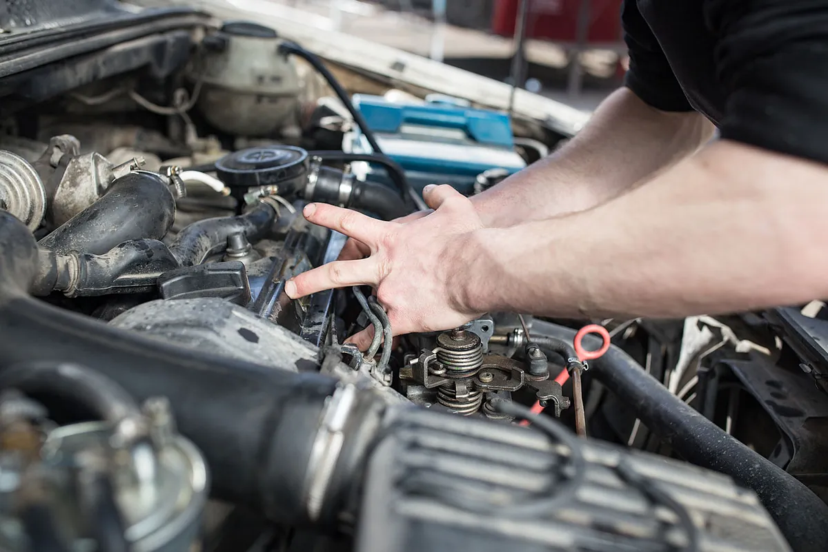 Mechanic installing a new clutch 